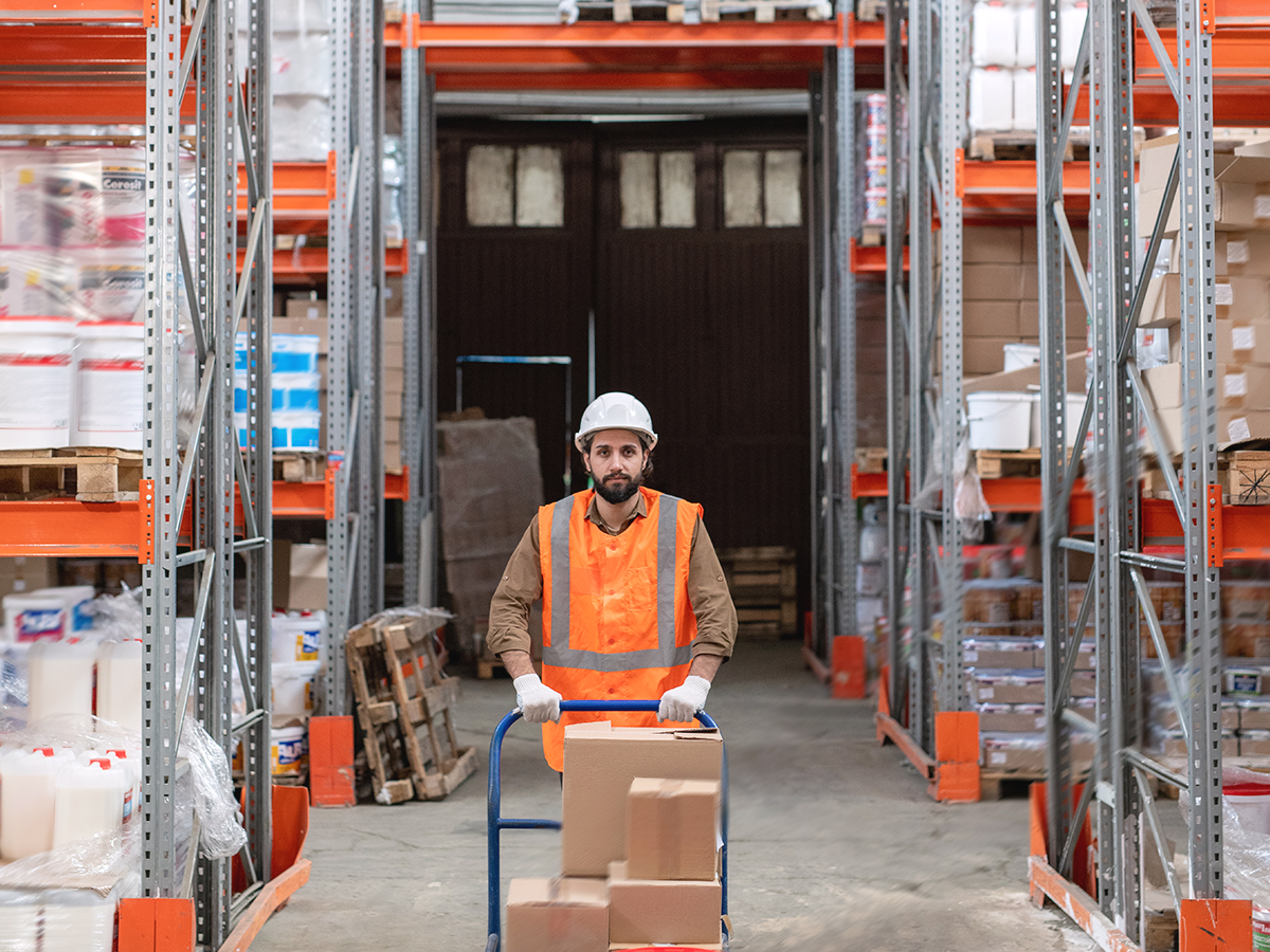 Logistics employee working inside a bonded warehouse