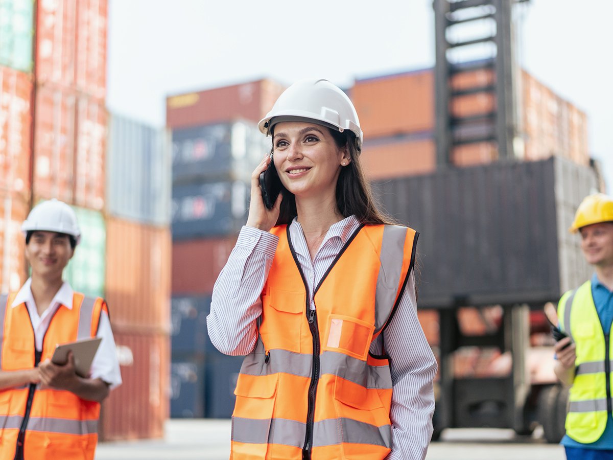 Woman in hard hat discussing ftz benefits
